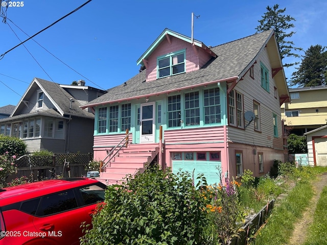 659 Florence Ave, Astoria, OR 97103 - view of front of home featuring a sunroom and roof with shingles