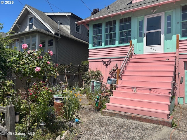659 Florence Ave, Astoria, OR 97103 - view of front of home with entry steps and roof with shingles