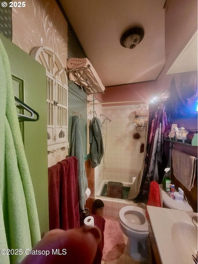 659 Florence Ave, Astoria, OR 97103 - full bath with a shower stall, toilet, and vanity