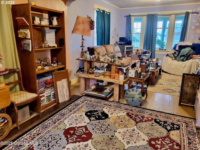 659 Florence Ave, Astoria, OR 97103 - living area featuring hardwood / wood-style flooring and ornamental molding