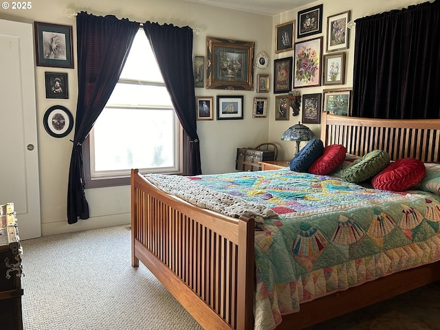 carpeted bedroom featuring multiple windows