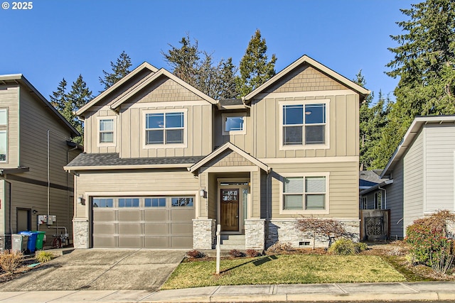 craftsman inspired home with a garage and a front lawn