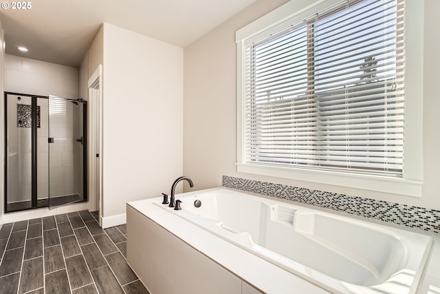 bathroom with independent shower and bath