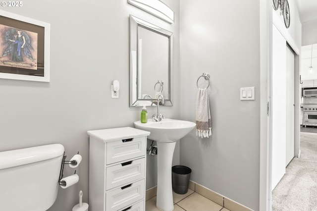 12600 SW Crescent St, Beaverton, OR 97005 - half bathroom featuring toilet and baseboards