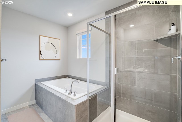 full bathroom with recessed lighting, baseboards, a garden tub, and a stall shower