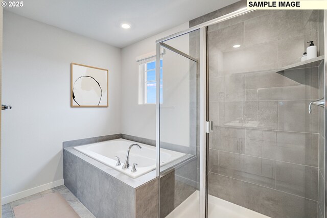 12176 SW Champlin Ln, Beaverton, OR 97007 - full bath with a bath, a shower stall, baseboards, and recessed lighting