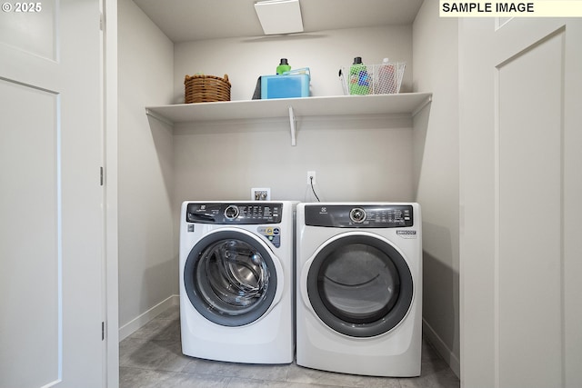 12176 SW Champlin Ln, Beaverton, OR 97007 - laundry room with washer and dryer and baseboards