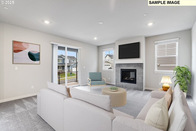 12176 SW Champlin Ln, Beaverton, OR 97007 - living area with carpet flooring, baseboards, recessed lighting, and a tile fireplace
