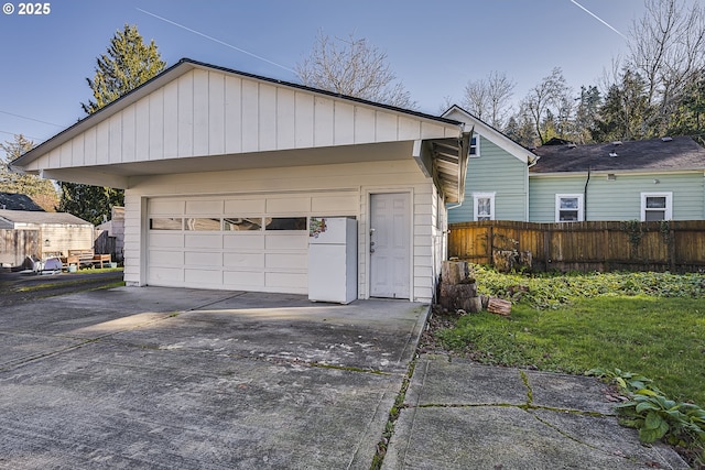 view of property exterior featuring a garage