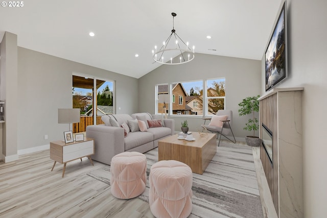 5477 SE Golden Rd, Hillsboro, OR 97123 - living room with a fireplace, a chandelier, light wood-style floors, baseboards, and recessed lighting