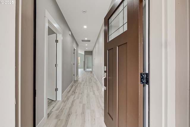 5477 SE Golden Rd, Hillsboro, OR 97123 - corridor featuring light wood-type flooring, baseboards, and recessed lighting
