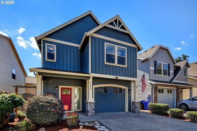 12626 Tradewind St, Oregon City, OR 97045 - craftsman inspired home featuring board and batten siding, asphalt driveway, a garage, and stone siding