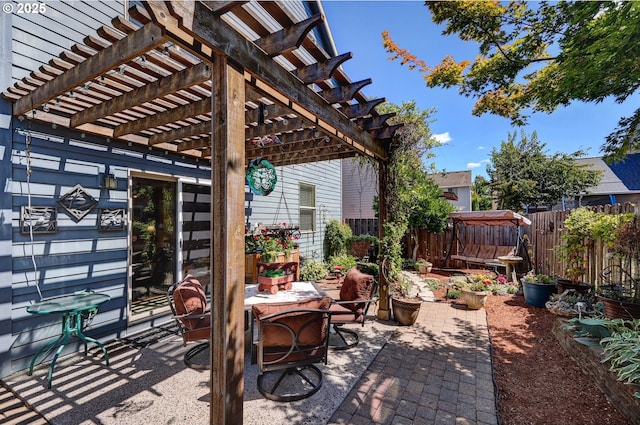 12626 Tradewind St, Oregon City, OR 97045 - fenced backyard featuring a pergola and a patio area