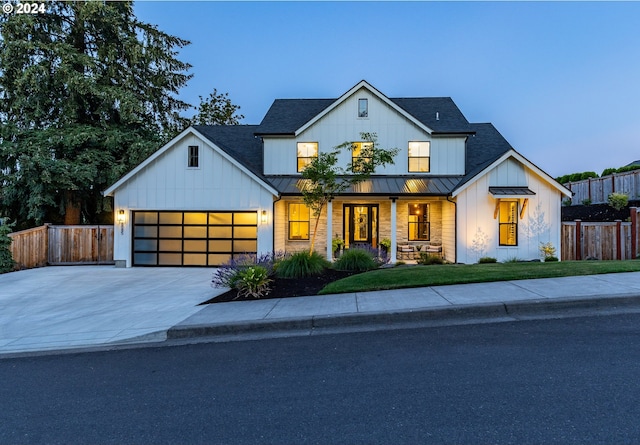 modern farmhouse style home with a garage