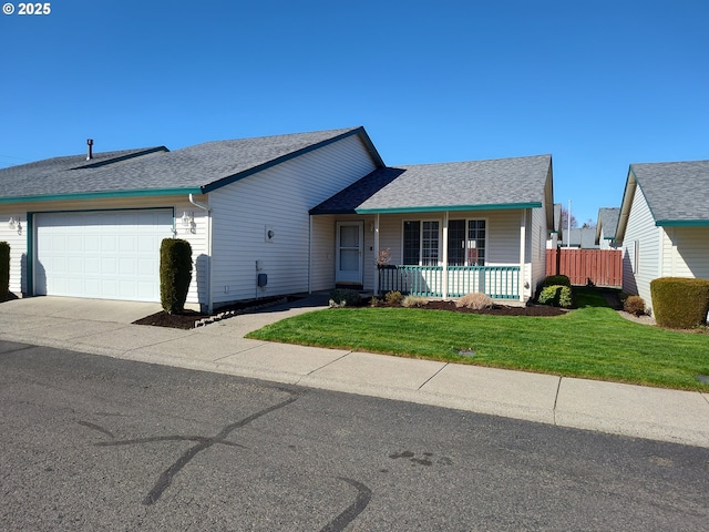 ranch-style house featuring covered porch, a front lawn, roof with shingles, and an attached garage