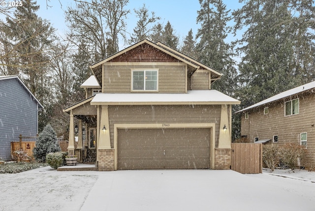 craftsman house with a garage