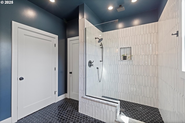 bathroom with recessed lighting, walk in shower, tile patterned floors, and visible vents