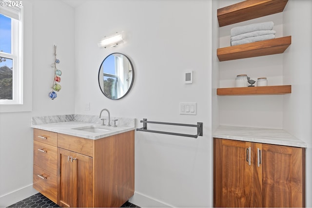 8466 NW Coast Rd, Seal Rock, OR 97376 - bathroom with baseboards and vanity