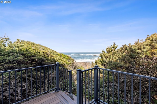 8466 NW Coast Rd, Seal Rock, OR 97376 - wooden terrace with view of water and beach