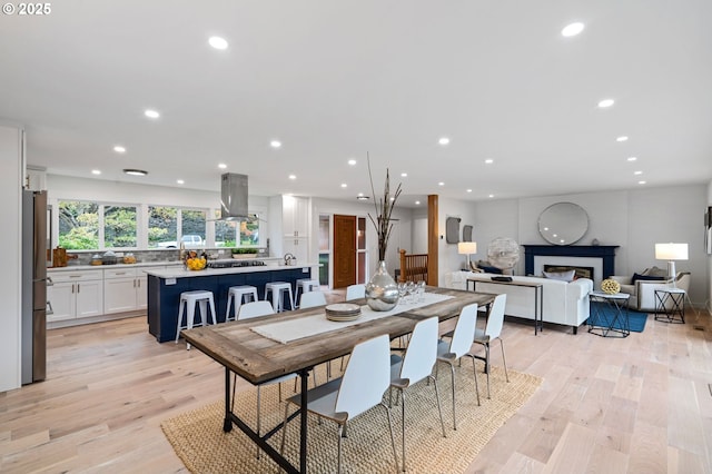 dining room with light hardwood / wood-style floors