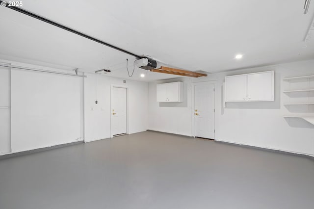 garage featuring a garage door opener