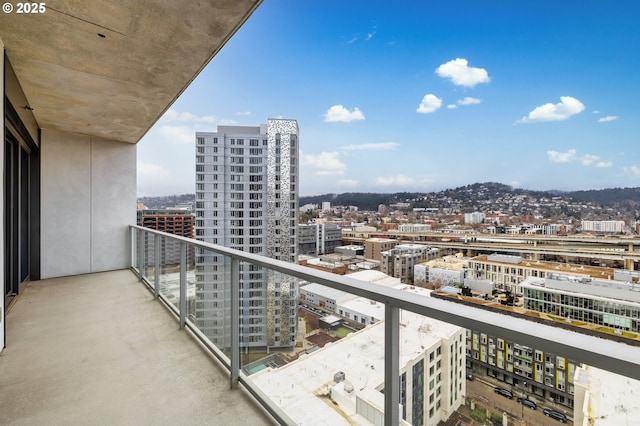 balcony featuring a city view