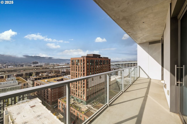 balcony featuring a view of city