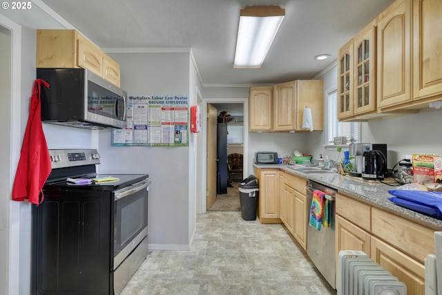 kitchen with light brown cabinetry, stainless steel appliances, crown molding, and glass insert cabinets