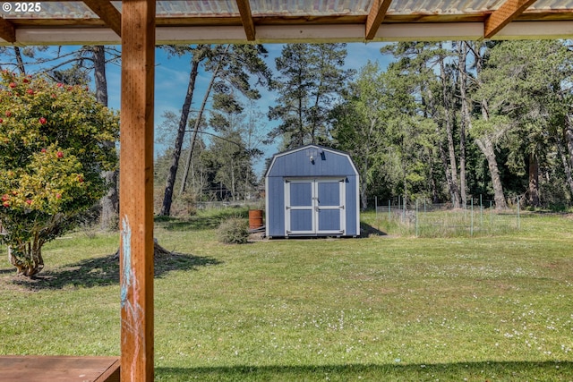view of shed featuring fence