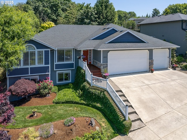 1802 NW Ogden St, Camas, WA 98607 - ranch-style home with an attached garage, driveway, roof with shingles, and a front yard