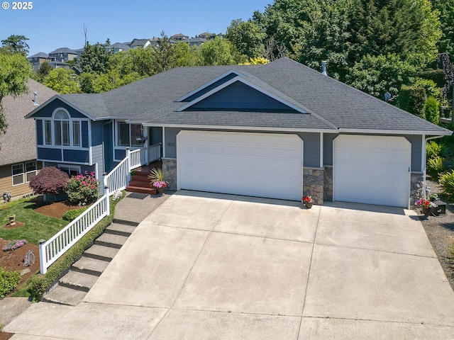 1802 NW Ogden St, Camas, WA 98607 - ranch-style home featuring roof with shingles, concrete driveway, a garage, and stone siding