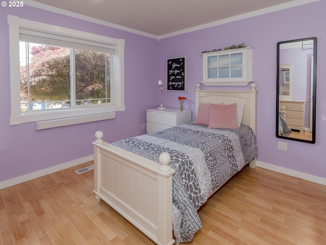 1802 NW Ogden St, Camas, WA 98607 - bedroom featuring wood finished floors, baseboards, and crown molding