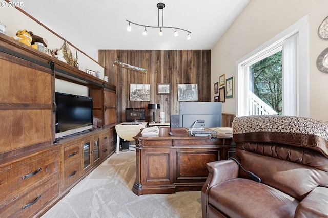 office space with light colored carpet and wooden walls