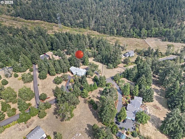 aerial view featuring a forest view