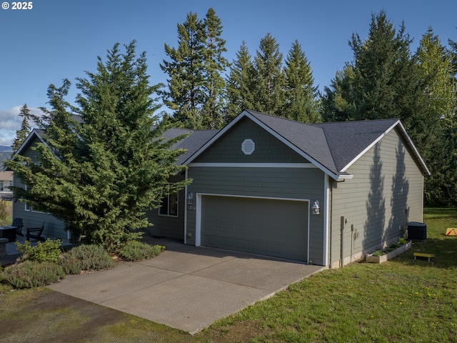 4080 Cunningham Dr, Mount Hood Prkdl, OR 97041 - view of front of property featuring an attached garage, concrete driveway, a front lawn, and cooling unit
