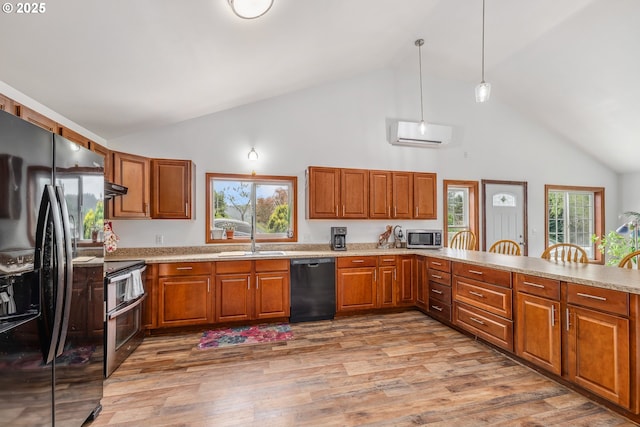 250 Valley View Rd, Sutherlin, OR 97479 - kitchen with black appliances, high vaulted ceiling, a sink, brown cabinets, and light countertops