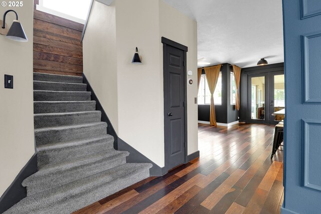 5416 Wales Dr, Eugene, OR 97402 - stairway featuring wood-type flooring and french doors