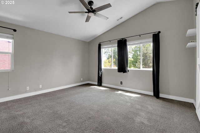 5416 Wales Dr, Eugene, OR 97402 - spare room with a ceiling fan, vaulted ceiling, and carpet