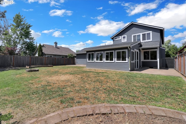 5416 Wales Dr, Eugene, OR 97402 - rear view of house featuring a patio and a fenced backyard