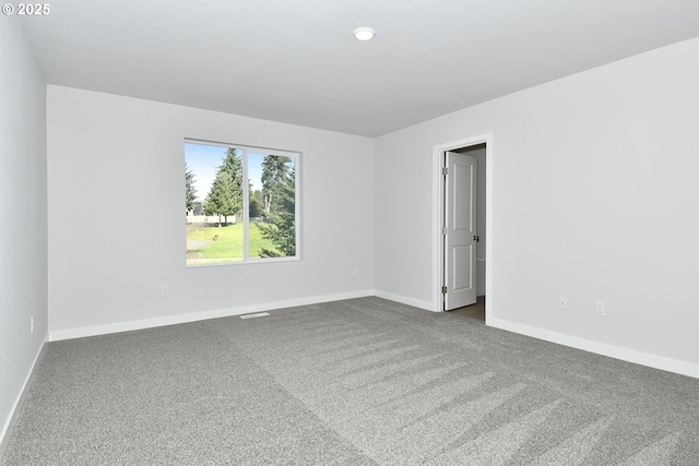 view of carpeted spare room