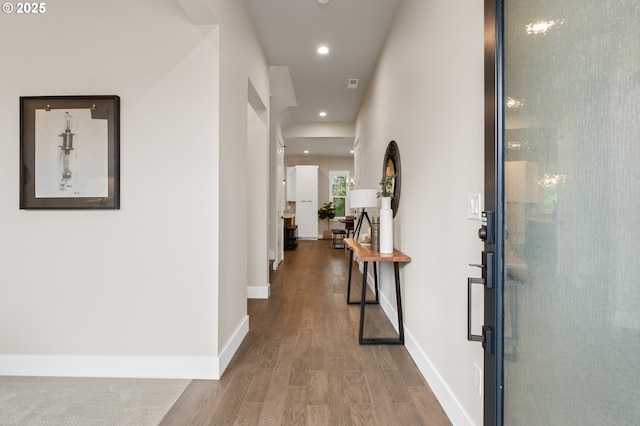 hallway featuring hardwood / wood-style flooring