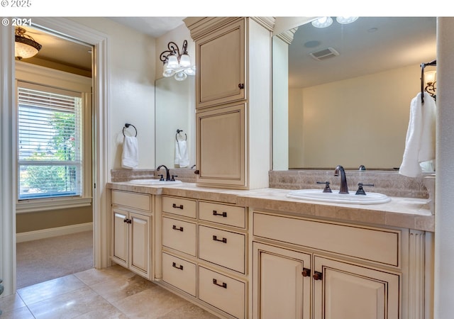 bathroom with vanity and tile patterned floors