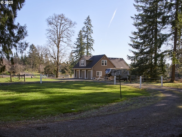 view of community featuring a yard