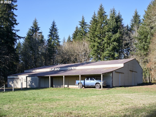 view of parking with a lawn