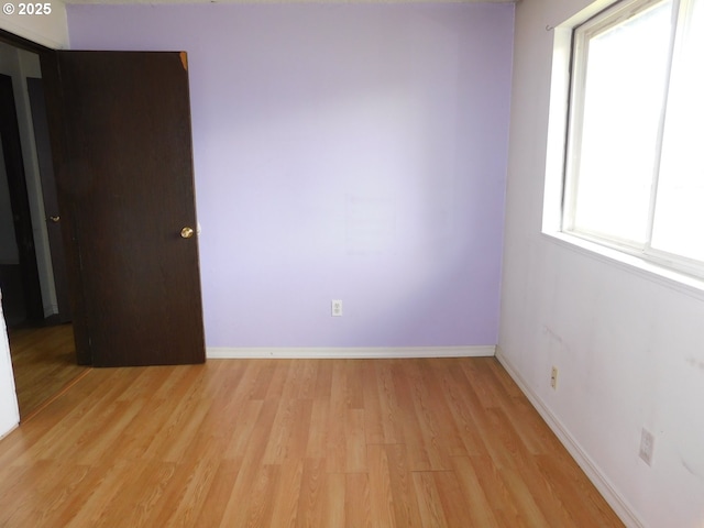 573 SW Harbor Pl, Warrenton, OR 97146 - spare room featuring light wood-style floors and baseboards