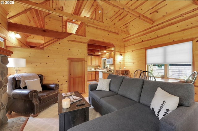 living room featuring wooden walls, beamed ceiling, wood ceiling, and high vaulted ceiling