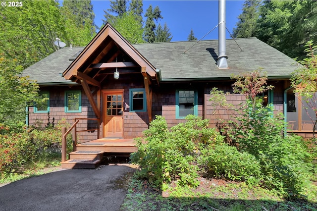 56411 Mckenzie Hwy Unit 6, Mckenzie Bridge, OR 97413 - view of front facade with a shingled roof