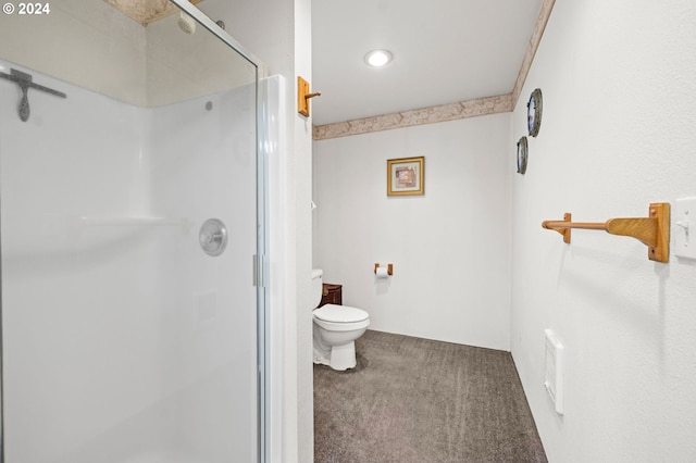 bathroom with toilet and walk in shower