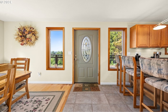 entrance foyer featuring plenty of natural light