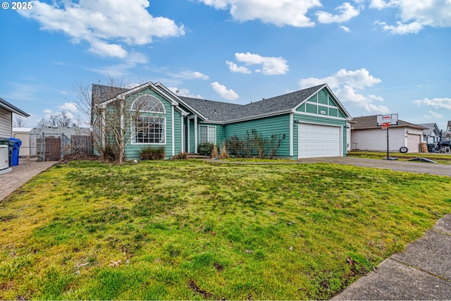 view of front facade featuring a garage and a front lawn